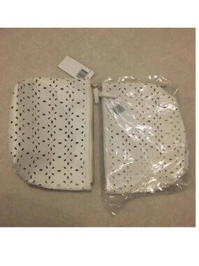 2 sets of Saks Fifth Avenue White Perforated makeup bags